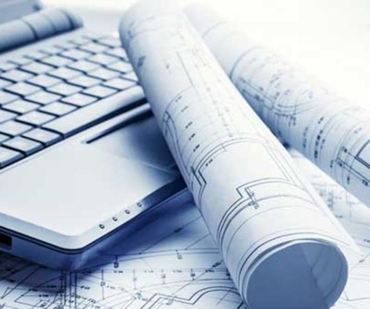 Two architect developers reviewing building plans at construction site